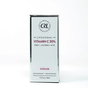 A bottle of vitamin c serum on top of a table.